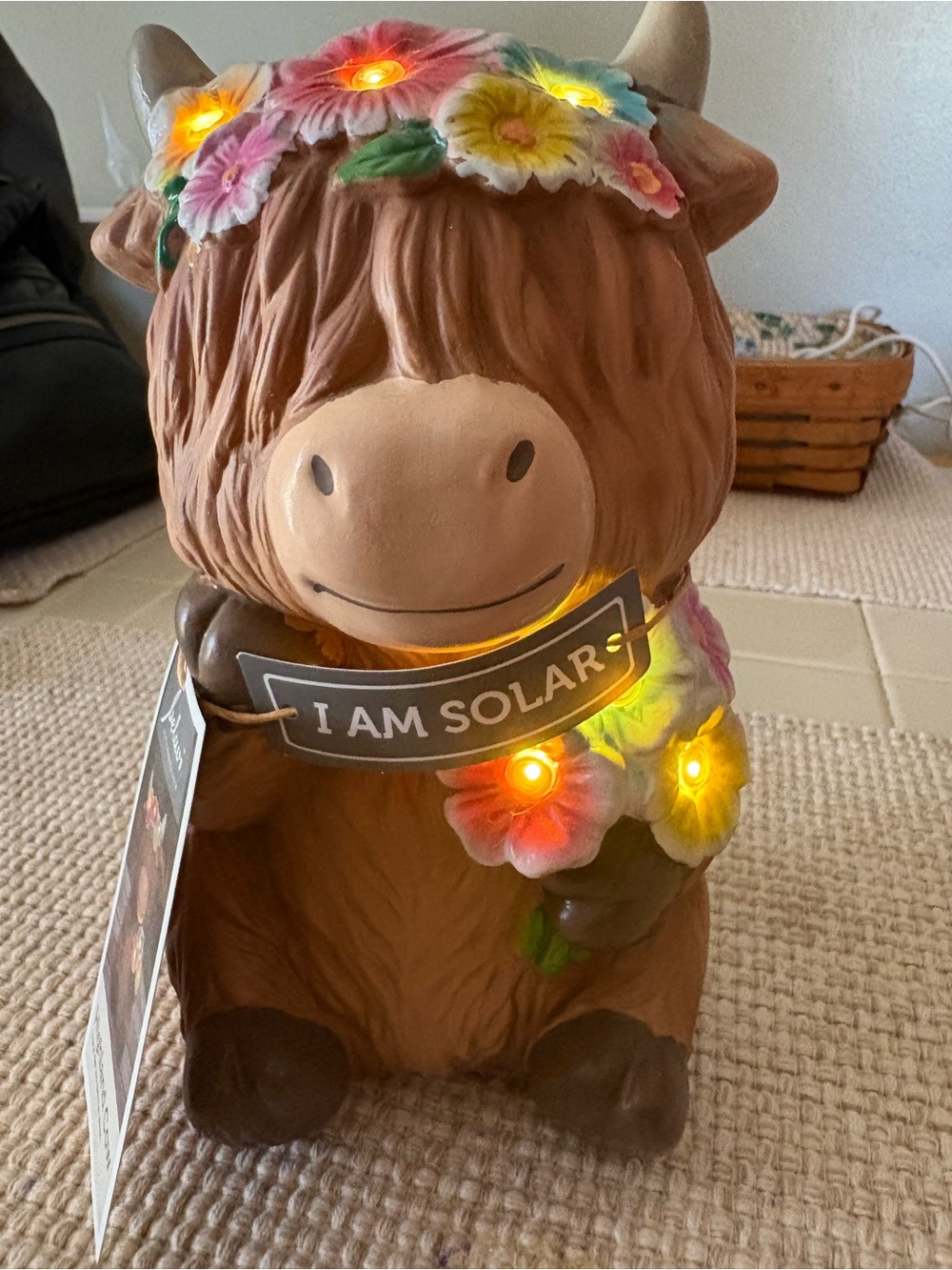 Solar-Powered Brown Highland Cow Lawn Accent with Floral Lights